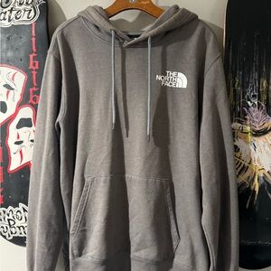 The North Face size large men used faded discoloration